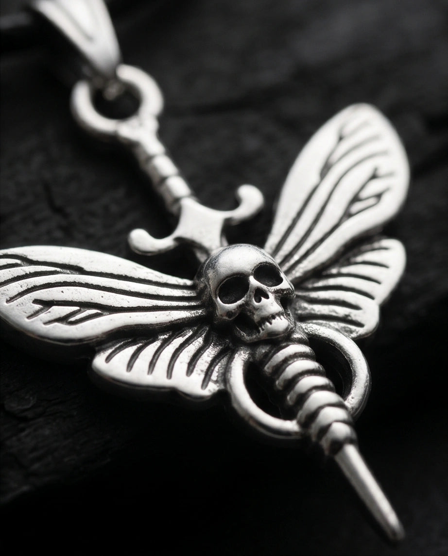 The Shadow Wing: Gothic Skull Moth Dagger Pendant Necklace