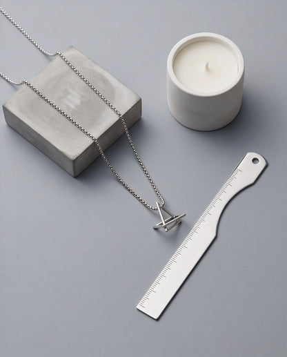 Silver Geometric Intersecting Triangle and Square Pendant Necklace