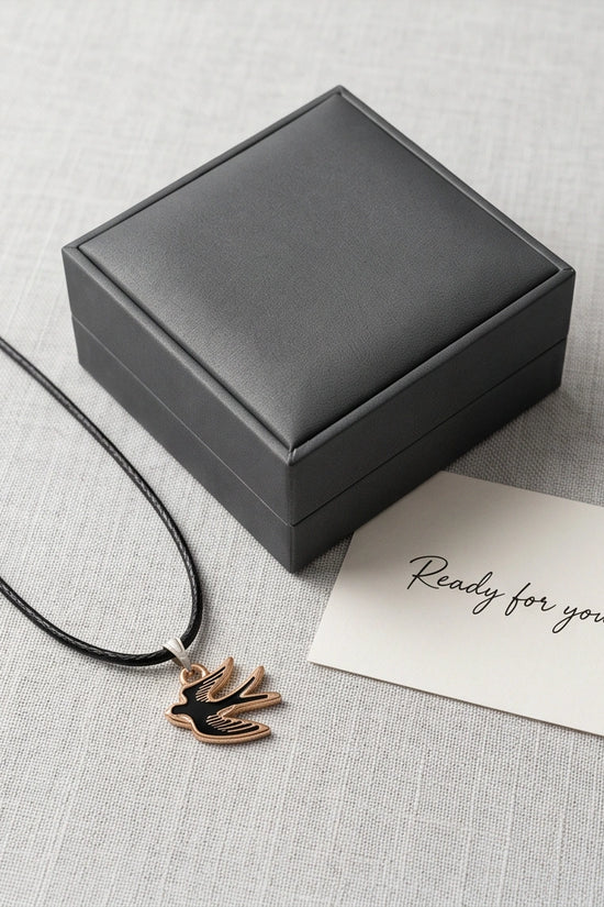 Gold and Black Soaring Swallow Necklace