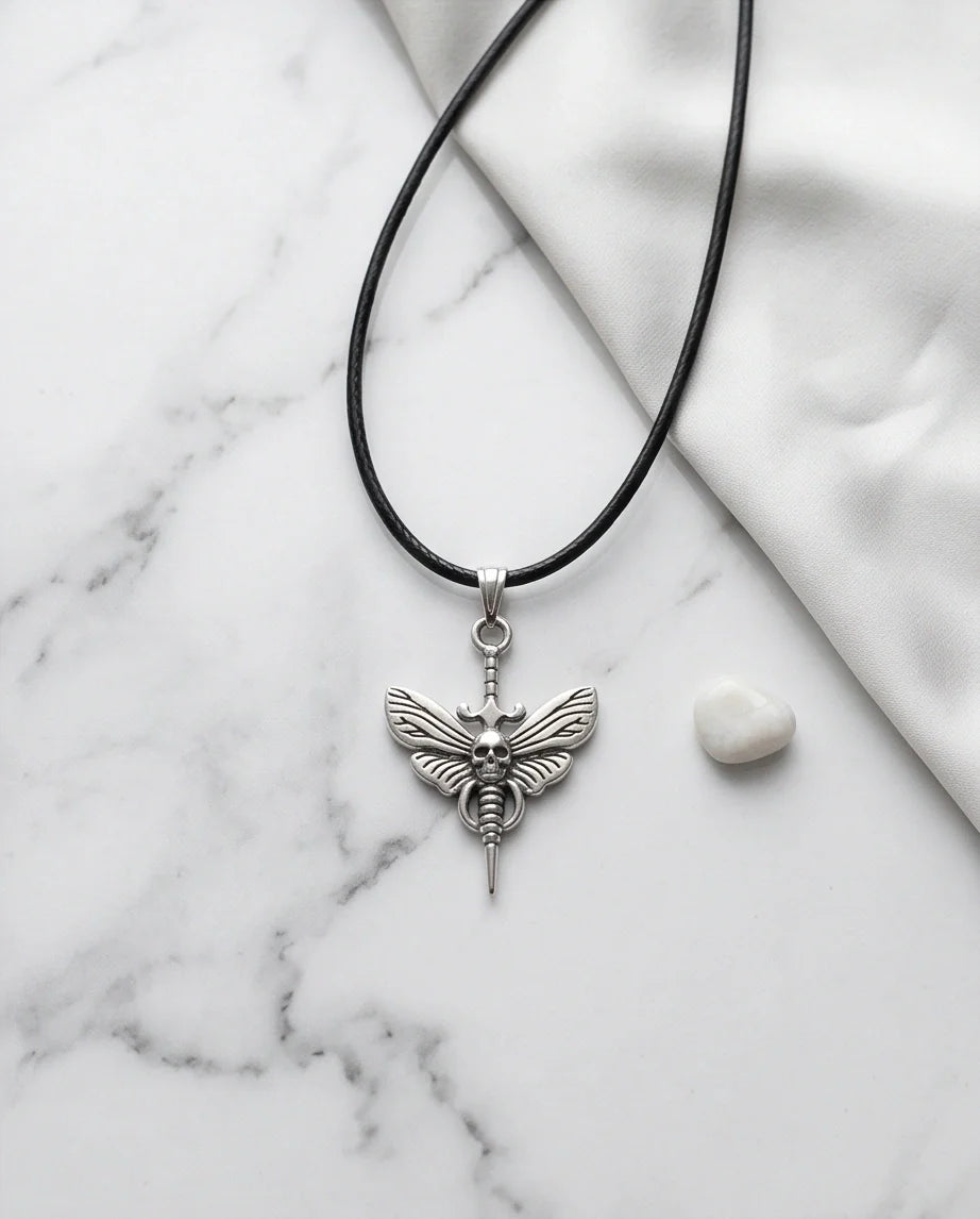 The Shadow Wing: Gothic Skull Moth Dagger Pendant Necklace
