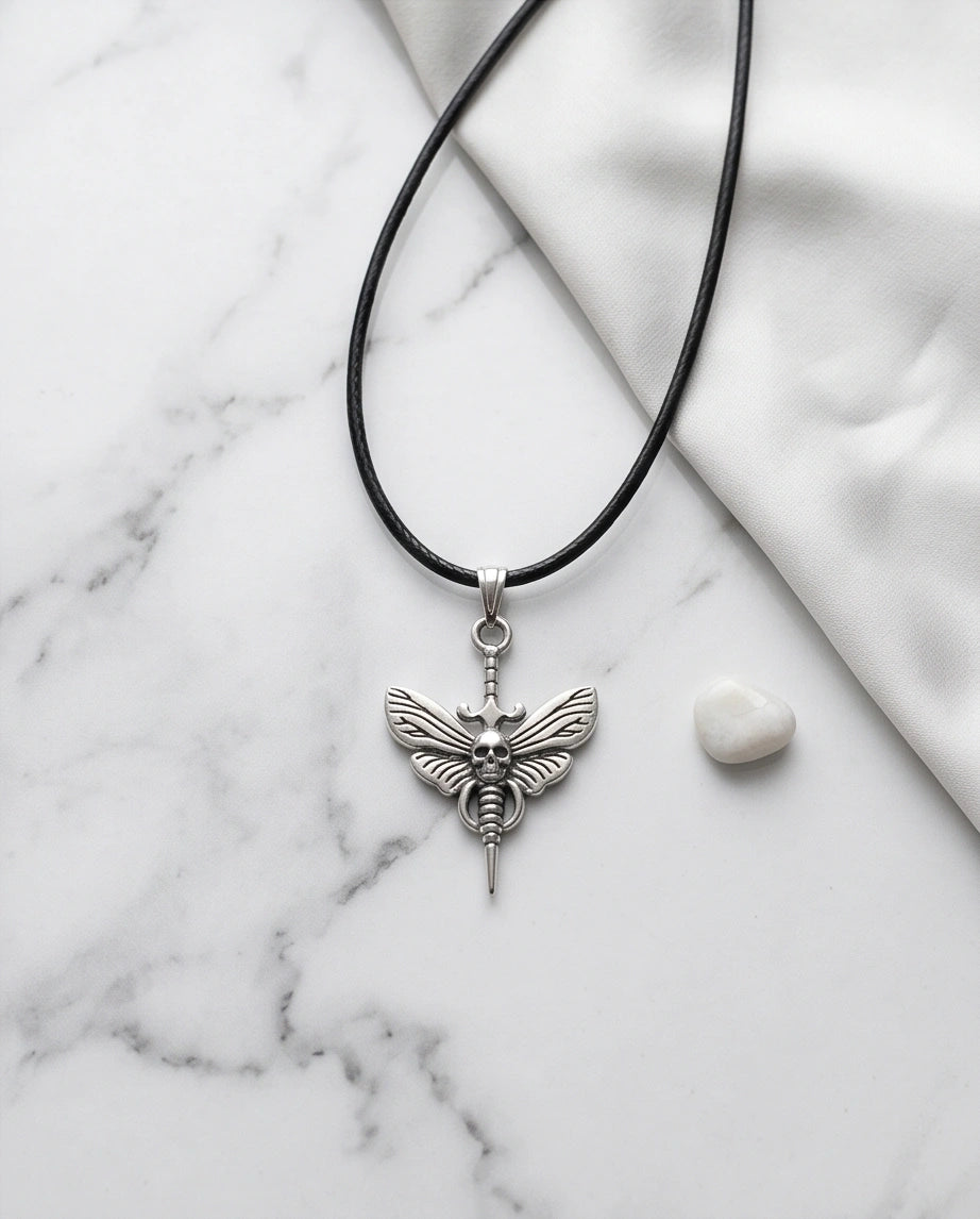 The Shadow Wing: Gothic Skull Moth Dagger Pendant Necklace