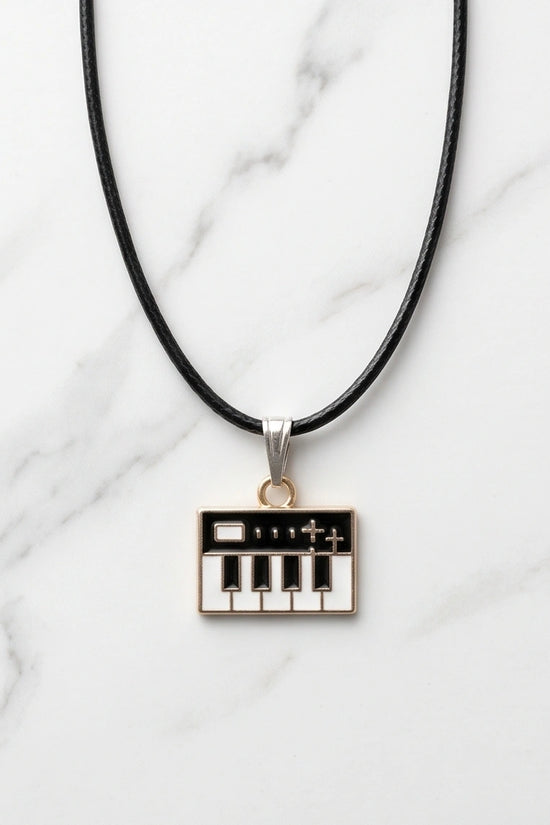 Gold and Black Synthesizer Keyboard Necklace