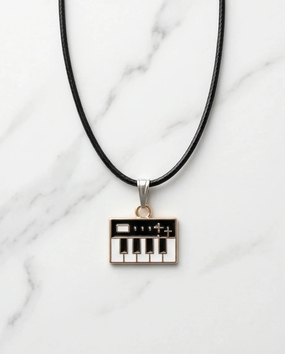 Gold and Black Synthesizer Keyboard Necklace