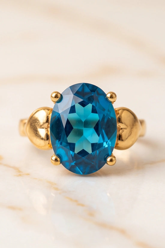 Gold Plated Sky Blue Topaz Oval Heart Accent Ring