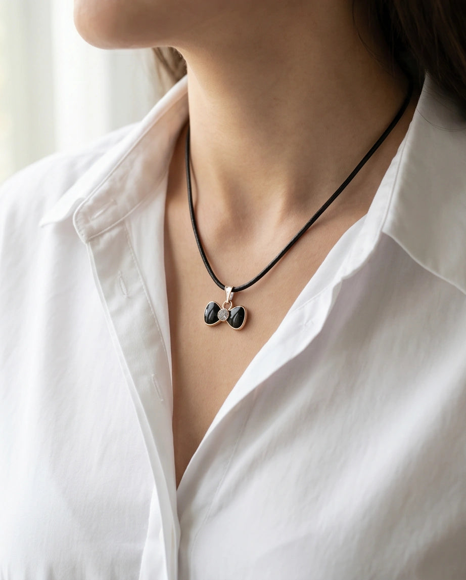 Gold Crystal and Black Bow Necklace