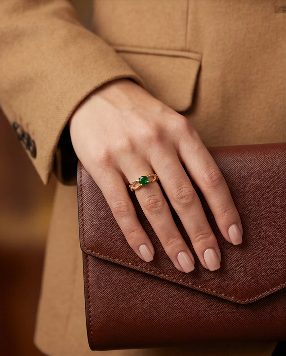 Gold Emerald Round Infinity Twist Ring