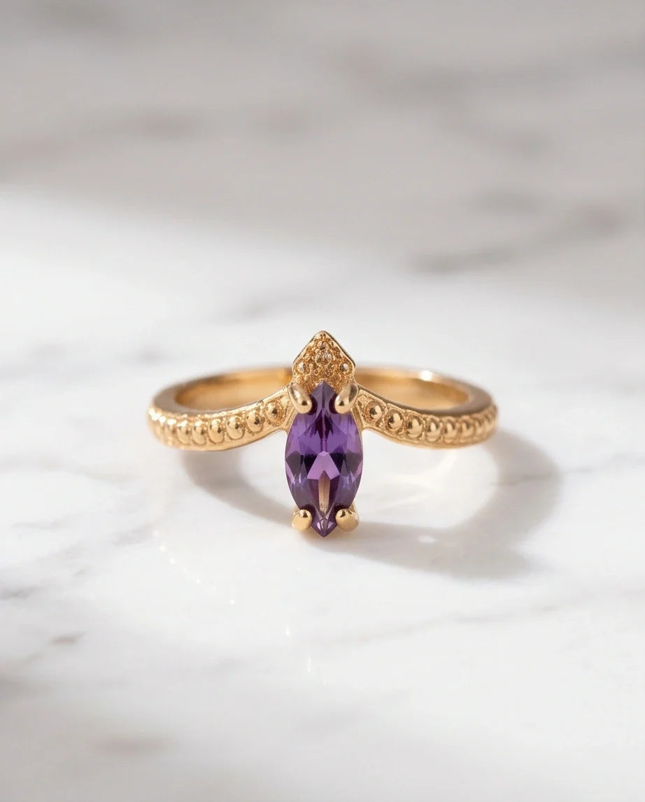 "Amethyst Aura" – Marquise Cut Gold Ring