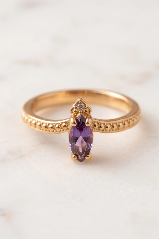 "Amethyst Aura" – Marquise Cut Gold Ring