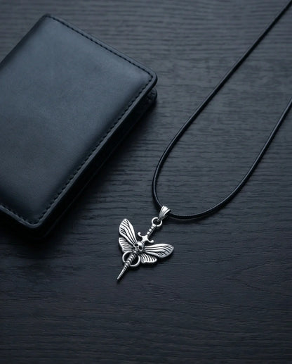 The Shadow Wing: Gothic Skull Moth Dagger Pendant Necklace