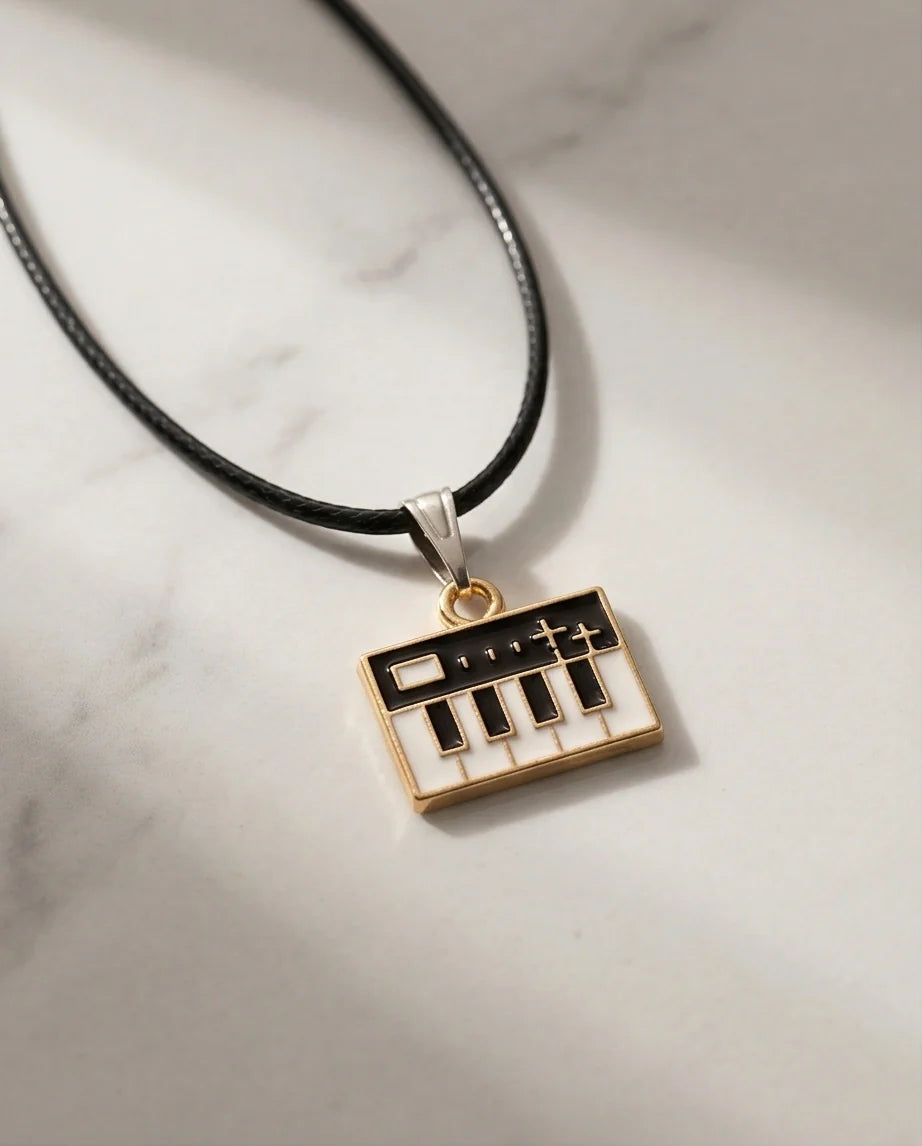 Gold and Black Synthesizer Keyboard Necklace