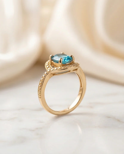 Luxury Gold Oval Swiss Blue Topaz Swirl Halo Ring