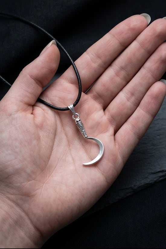 The Reaper's Crescent: Gothic Skull Sickle Pendant Necklace