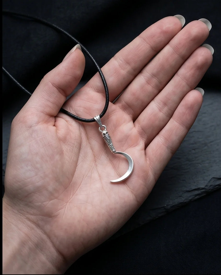 The Reaper's Crescent: Gothic Skull Sickle Pendant Necklace