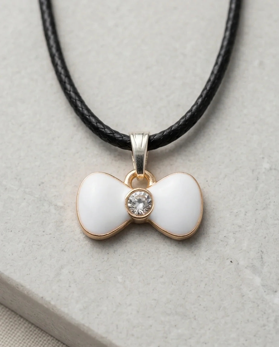 Gold and White Bow Tie Pendant Necklace