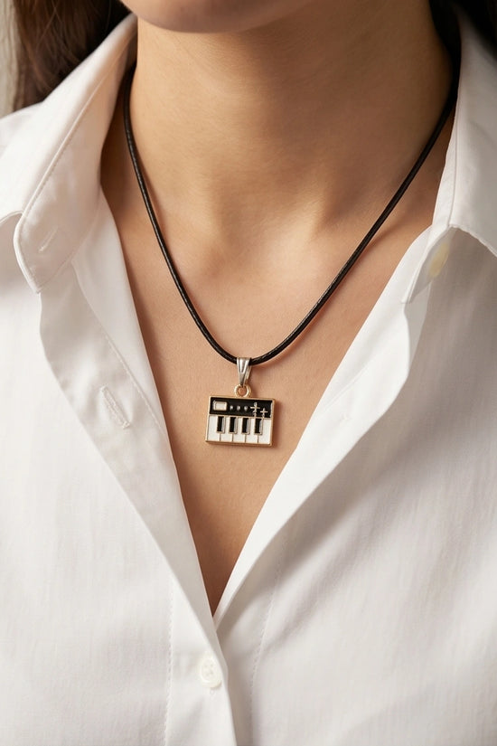 Gold and Black Synthesizer Keyboard Necklace