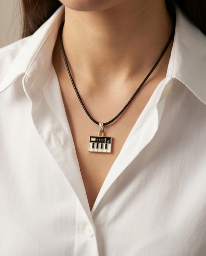 Gold and Black Synthesizer Keyboard Necklace